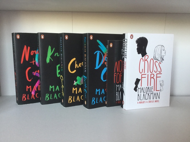 The covers of Noughts and Crosses, Knife Edge, Checkmate, Double Cross, Nought Forever, and Cross Fire by Malorie Blackman